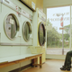 A guy doing laundry and almost certainly thinking about how bad doing laundry is. Photo credit: Jamie McDonald /Allsport/Getty